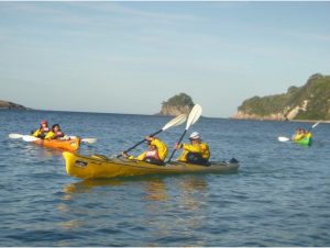 Sea-kayaking on Mercury Bay on our way to Cathedral Cove.