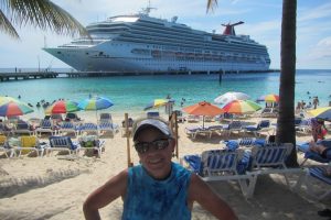 Julie at our chairs on the beach in Grand Turk
