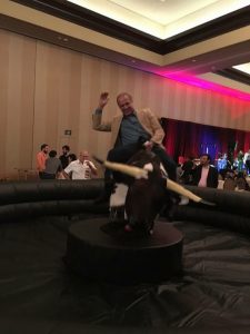 Rocky riding the mechanical bull