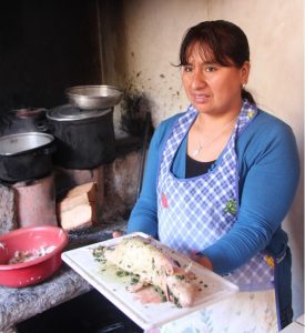 Emma, Our Urubamba Home Host making Guinea Pig